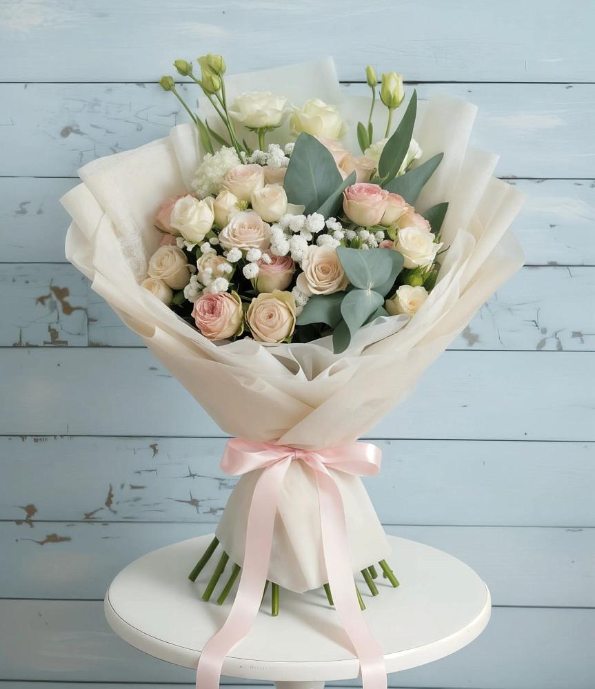 Букет цветов из: Розы и Лизиантусы в Юганце