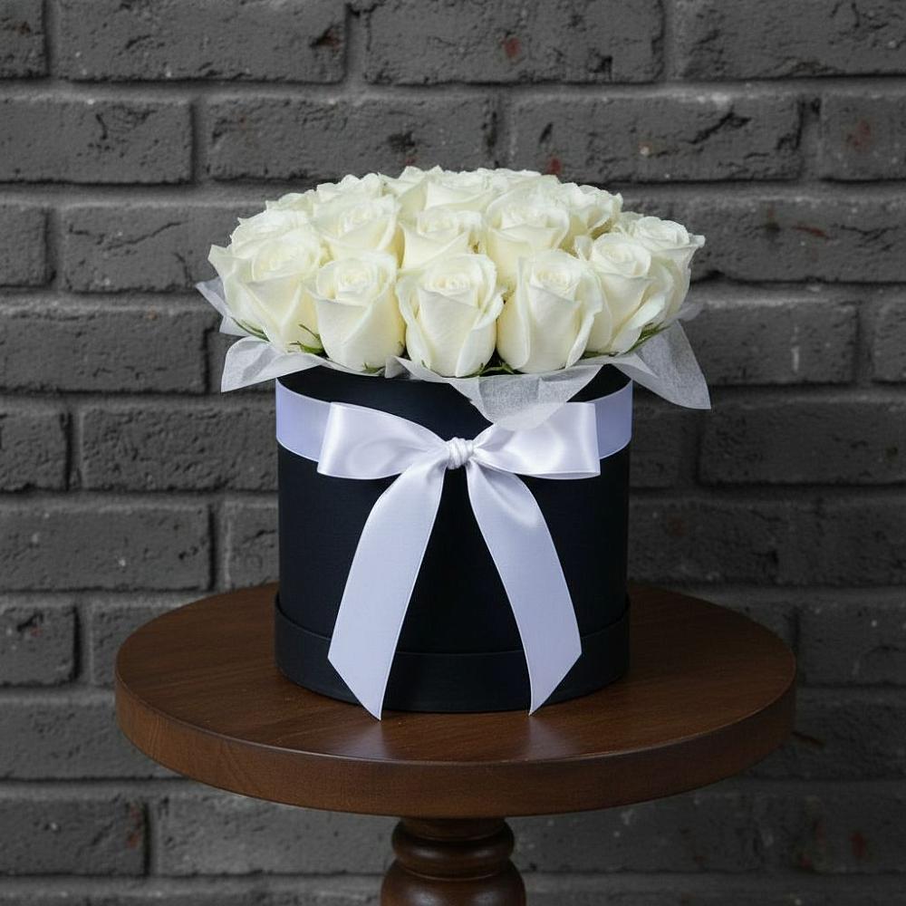 Цветочная композиция из Розы в шляпной коробке в Юганце